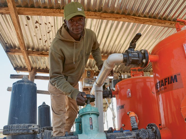 Estache W Adje works for Alafia Wanru farm, which leases plots to farmers. 