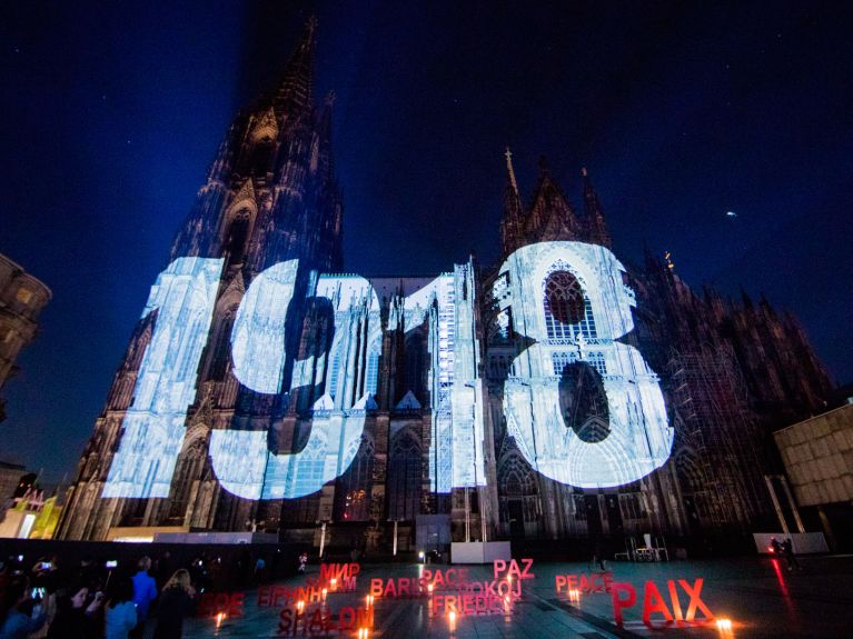 A projection on Cologne Cathedral commemorates the end of the First World War 100 years ago.