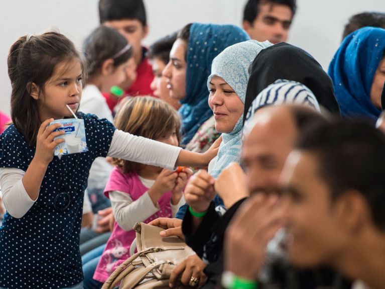 Asylum seekers in an arrival centre in Gießen