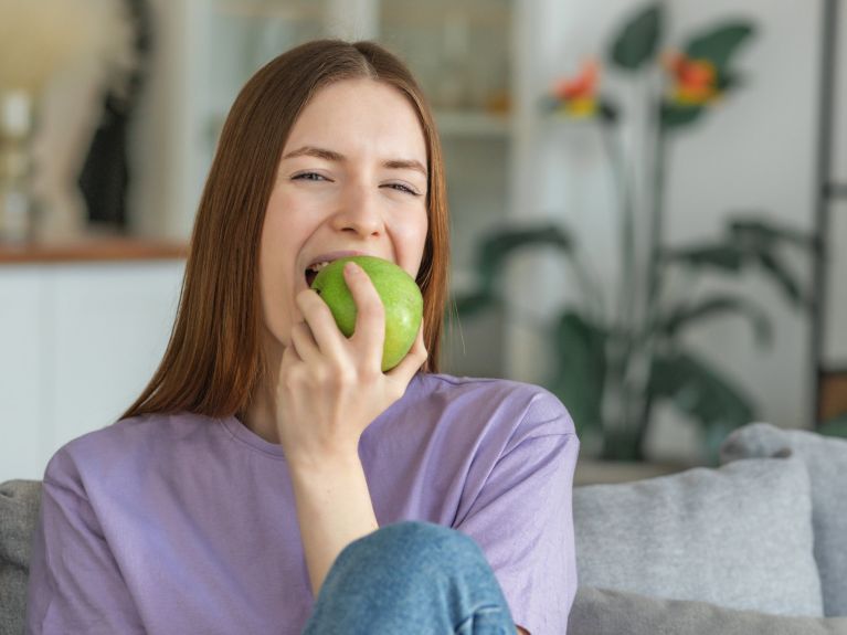 “In den sauren Apfel beißen” or “biting the bullet”  “In den sauren Apfel beißen” or “biting the bullet”